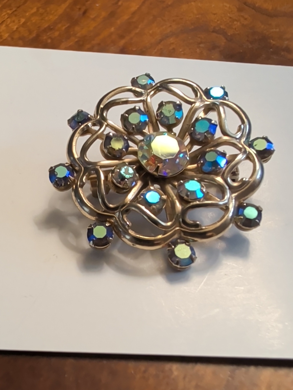 Aurora Borealis brooch Vintage AB 17 stones prong set gold tone Starburst Atomic